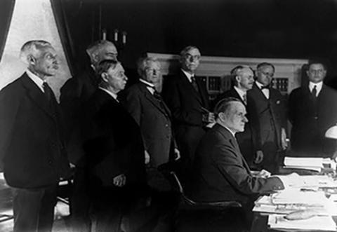 President Coolidge signing Revenue Act into law