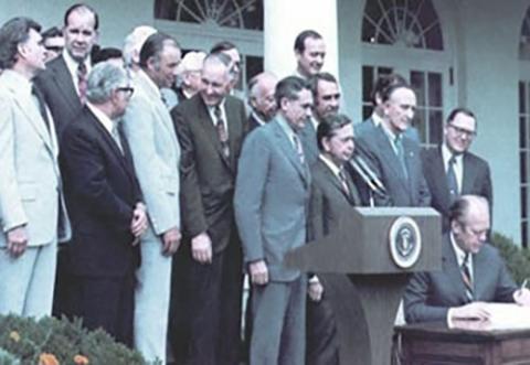 President Ford signing ERISA into law