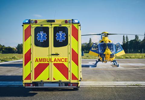 An ambulance and an air ambulance helicopter