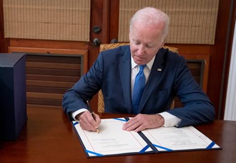 President Biden signing the SECURE 2.0 Act