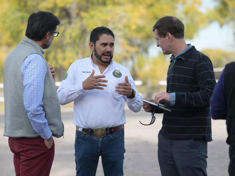 Three people discussing labor issues