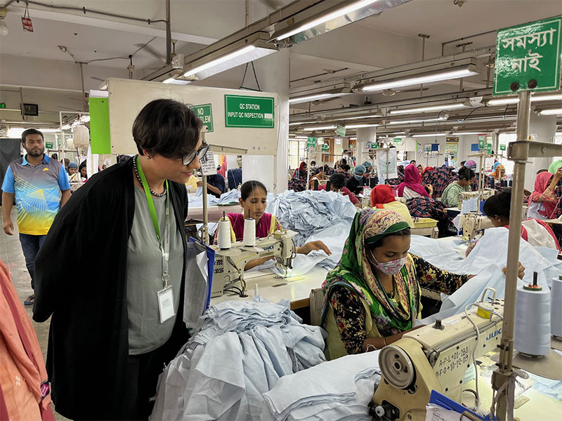 A labor attaché meets with the workers at a garment factory in Bangladesh