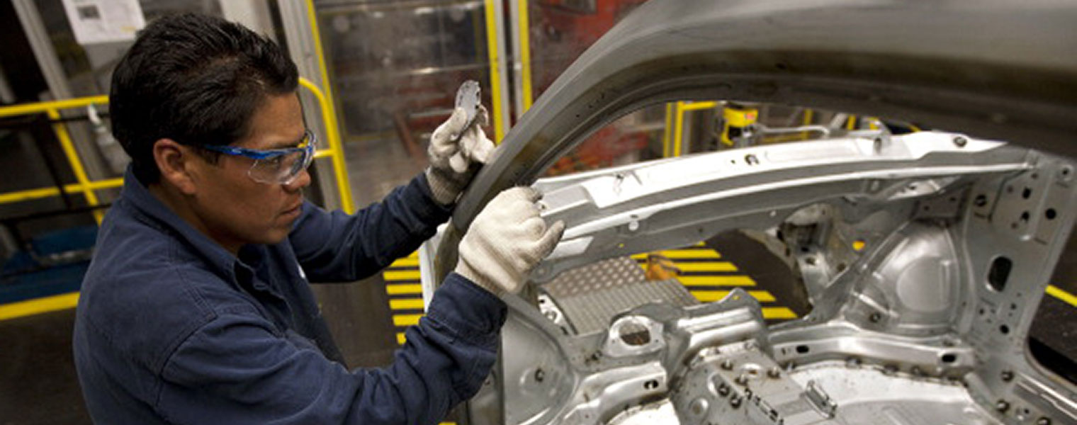 An employee works on the production line of the new generation Volkswagen AG Beetle at the company’s assembly plant in Puebla, Mexico. Volkswagen, seeing 22 percent U.S. sales growth in its namesake brand this year so far, announced management changes and other efforts aimed at improving its quality reputation in the U.S. Puebla, Mexico. August 5, 2011.