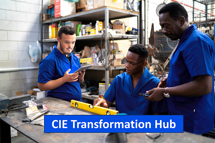 Three people working together in a shop. One has a disability. The words “CIE Transformation Hub” appear below them.