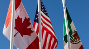 The flags of Canada, the United States and Mexico.