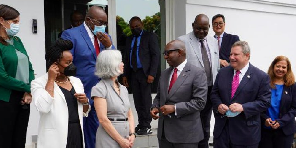 Thea Lee poses with other officials in the Democratic Republic of the Congo. 