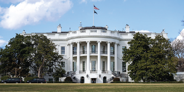 Exterior shot of the White House in spring.