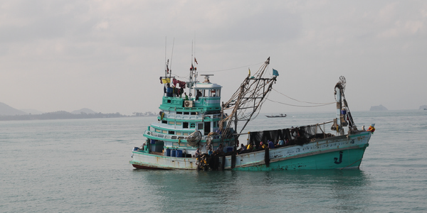 A fishing boat in the ocean.