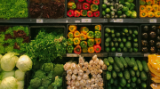 Vegetables stacked in a grocery store. Photo by nrd on Unsplash 