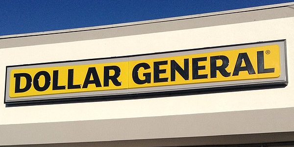 The Dollar General logo on a storefront.