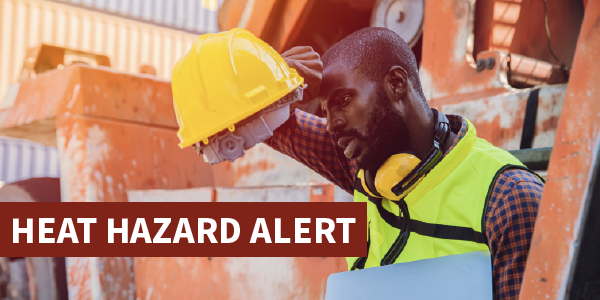 A construction worker wipes his brow on a hot worksite. Text reads: Heat hazard alert.