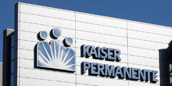 Closeup of the Kaiser Permanente logo seen at its Irvine Medical Center in Orange County, California.