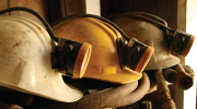 Three mining helmets. 