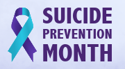 A purple and teal ribbon with the text “Suicide Prevention Month.”