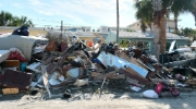 Rubble is collected along the side of the road in Florida, in the aftermath of Hurricane Helene 