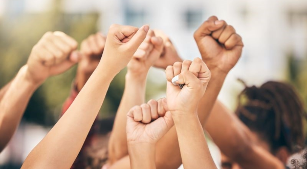 A group of fists pointed in the air.