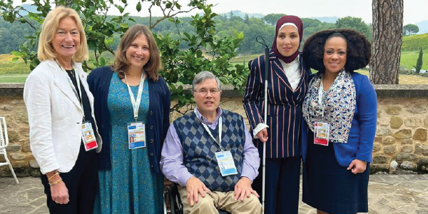 Taryn M. Willams with four other attendees of the G7 Ministerial Meeting on Inclusion and Disability