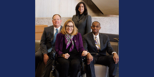 The four award recipients pictured together: Jennifer Sheehy, Geoffrey Kenyon and Tony Williams (seated) and Patricia Davidson (standing). 