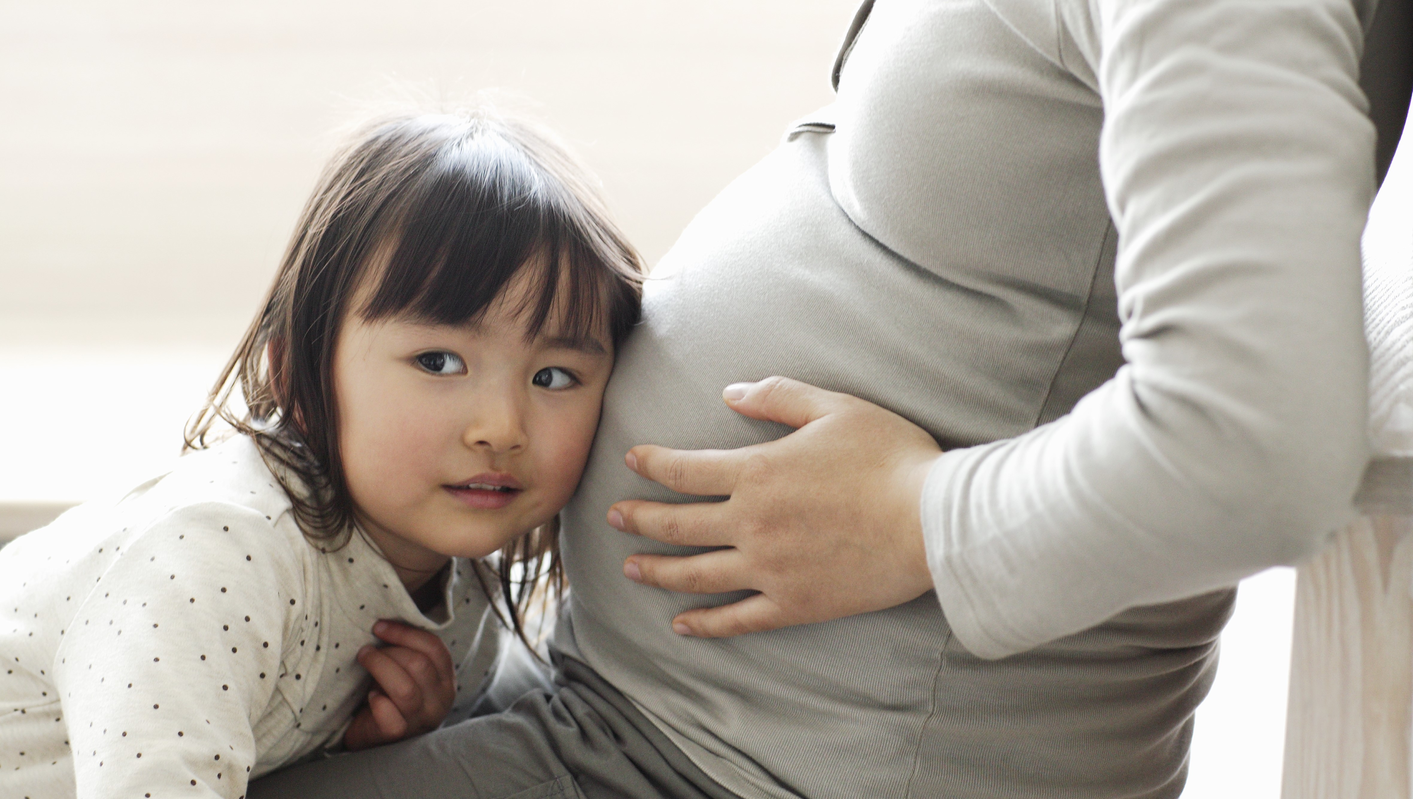 Pregnant woman and kid