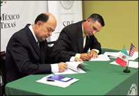 Travis Clark, director of OSHA's Corpus Christi Area Office signs alliance renewals with Consul of Mexico Juan Carlos Cué Vega in Brownsville, Texas.