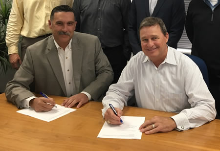 OSHA Area Director Travis Clark (left) and McCarthy Building Companies President Jim Stevenson recently signed an alliance to help protect employees involved in construction at Christus Spohn Hospital in Corpus Christi.