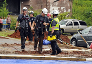 Rescue personnel conclude their search after finding the victim's body.